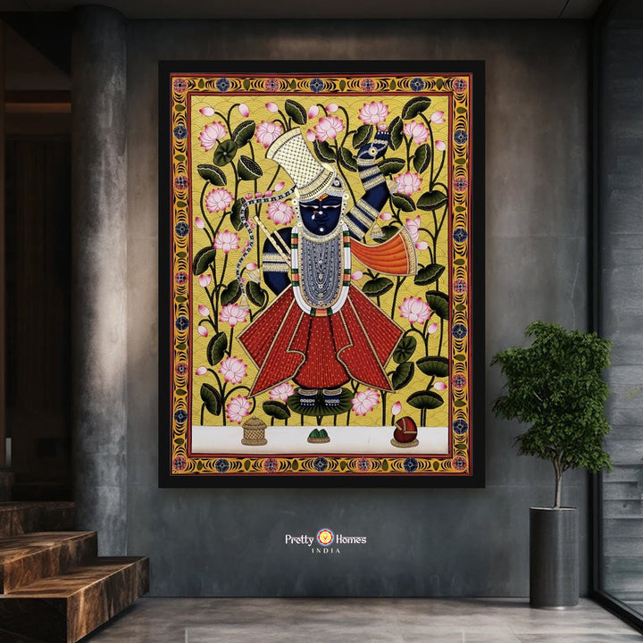 Devotional Pichwai painting of Shrinathji Darshan depicted beside a calm lotus pond scene