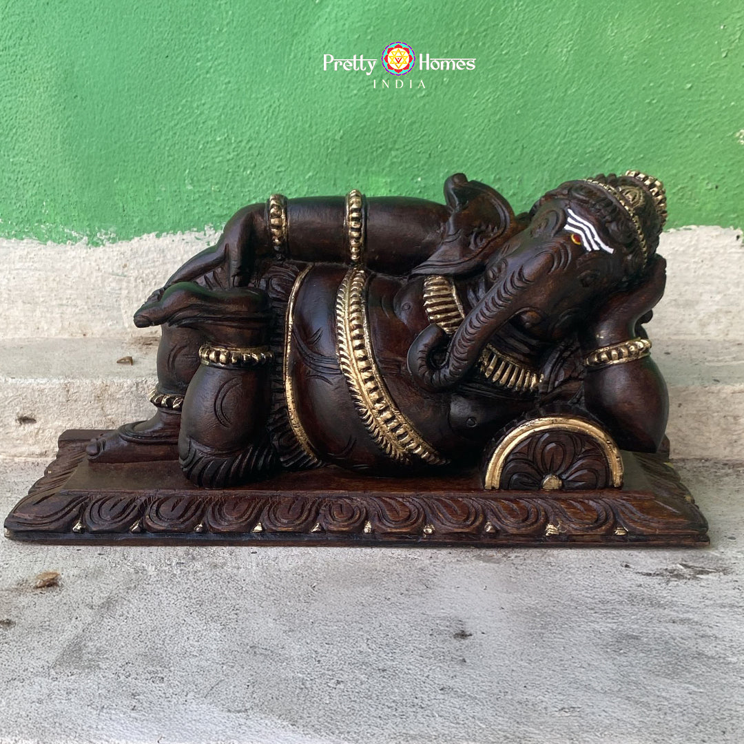 Resting Ganesha statue in antique gold finish