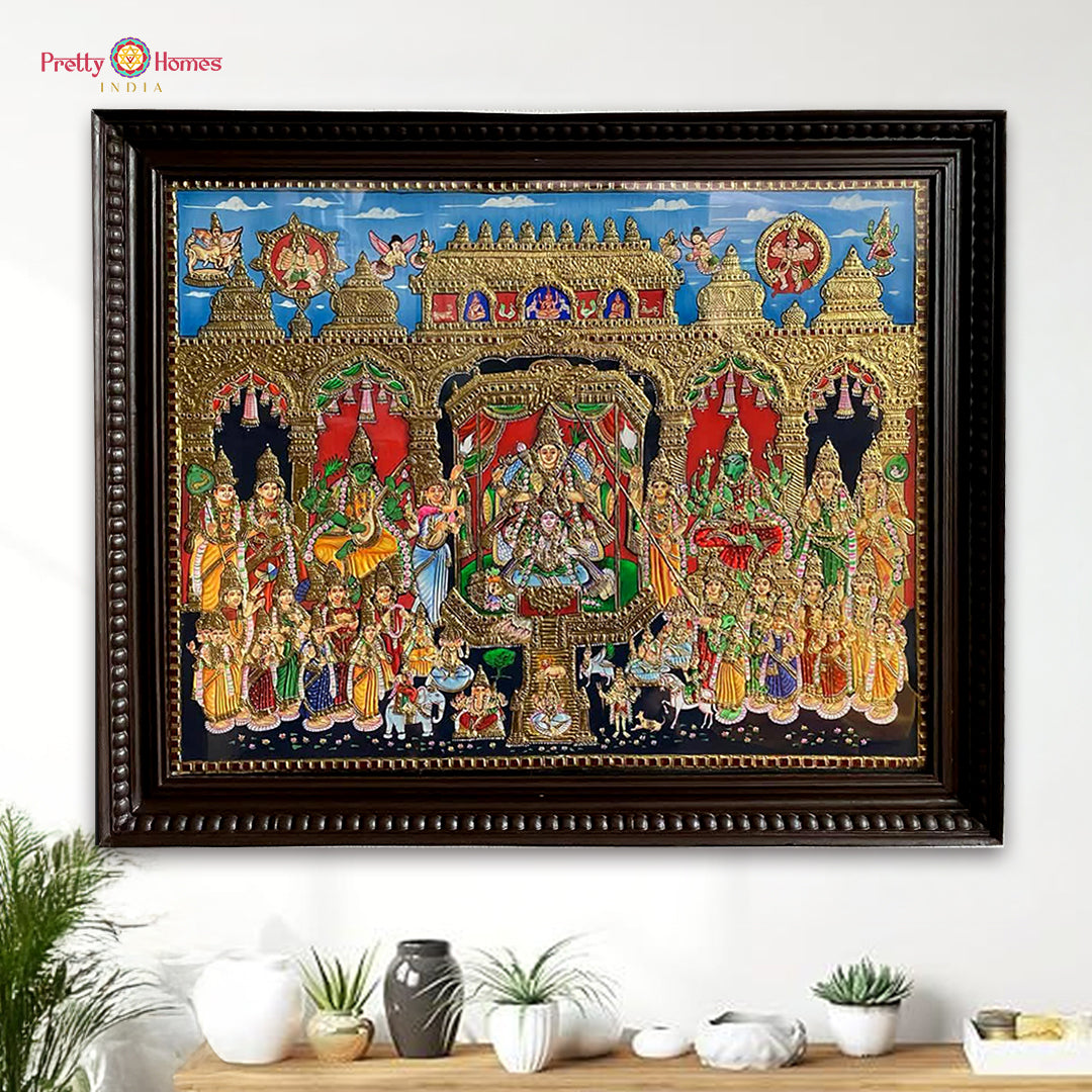 Tanjore painting of Rajarajeshwari crafted with 22K gold foil in traditional style.