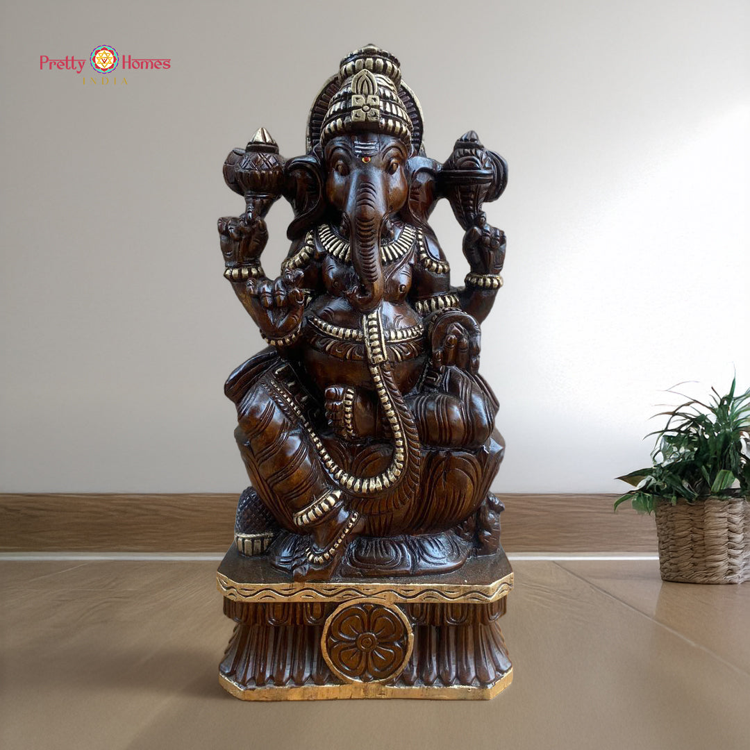 Antique gold wood carved traditional Ganesha statue with temple-inspired artistry