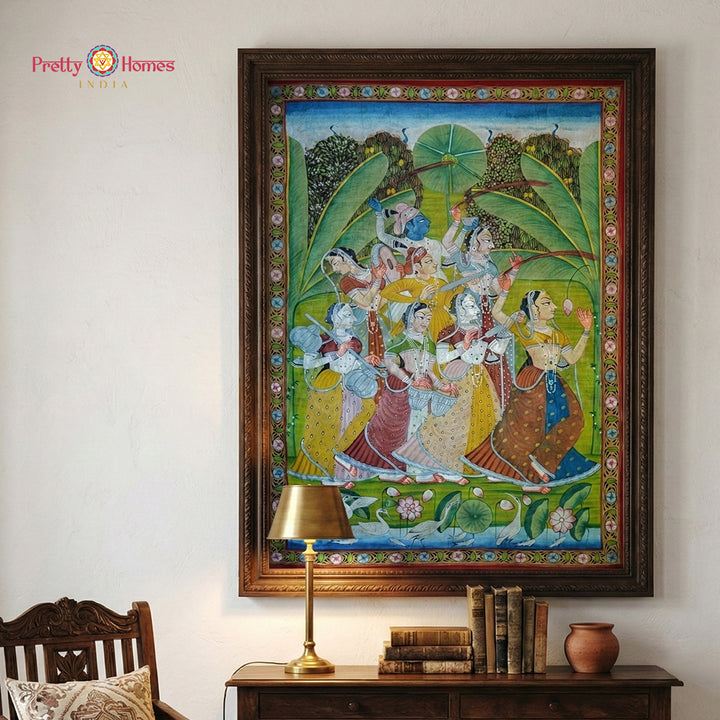 Vintage pichwai painting of gopikas playing Holi in garden scenery
