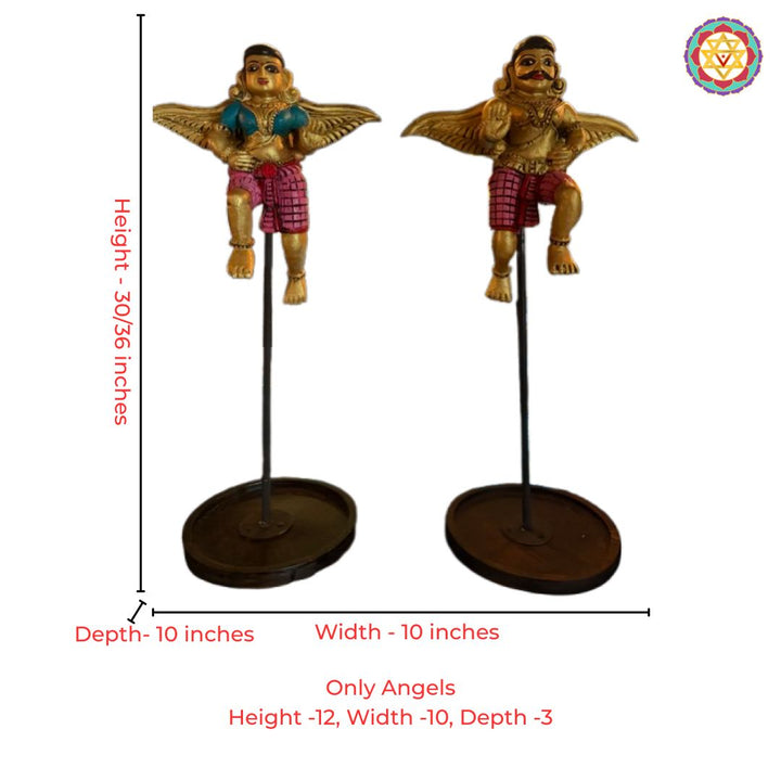 Detailed wooden Gandharva statues showcasing celestial figures in a protective blessing posture.