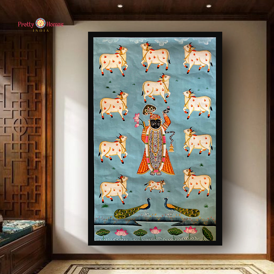 Tranquil blue Shrinathji pichwai painting with sacred cows in devotional setting